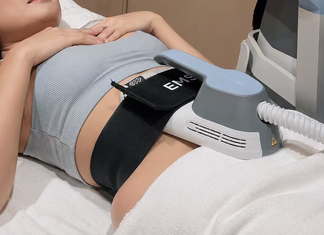EMSCULPT treatment in progress on the abdomen